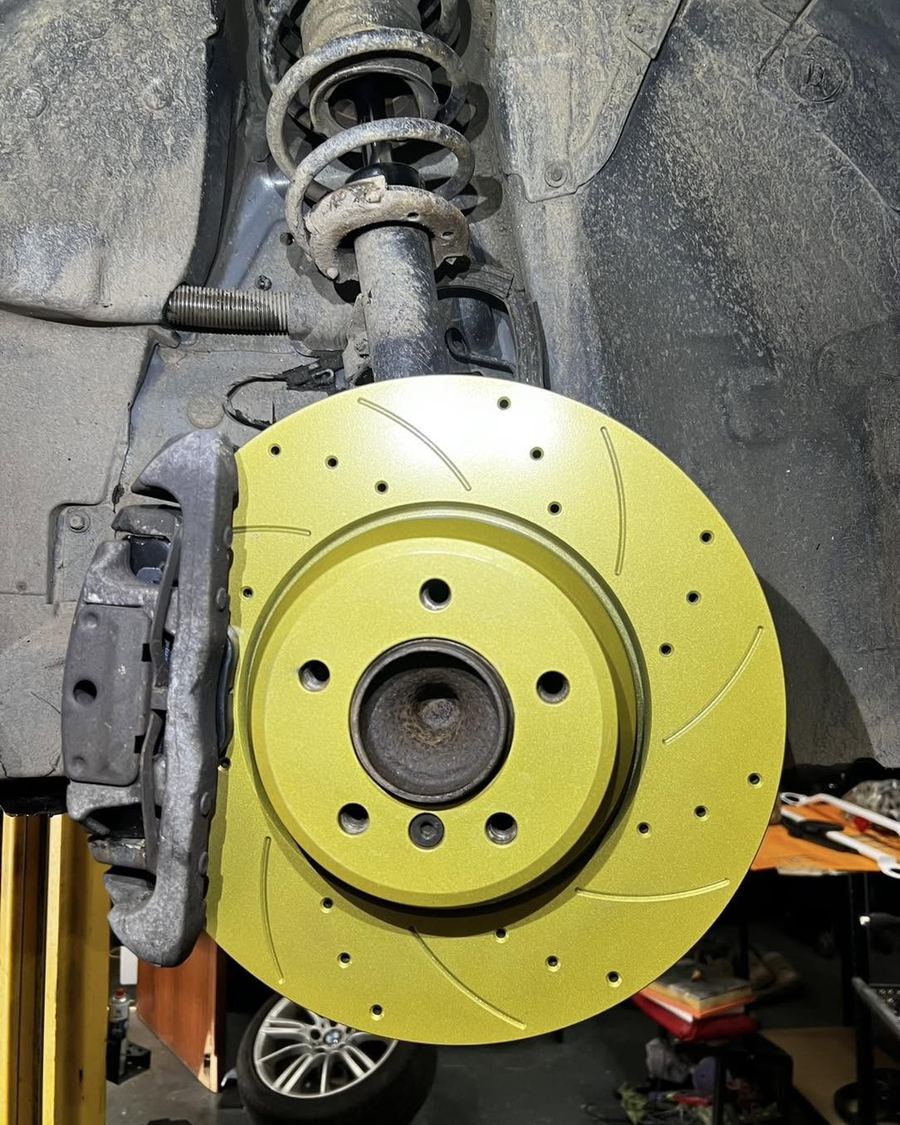 Gold drilled and grooved brake disc fitted to the hub
